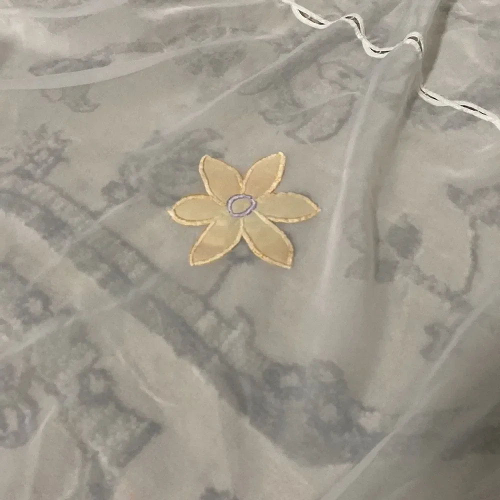 Shower curtain, white background flowers in yellow green purple